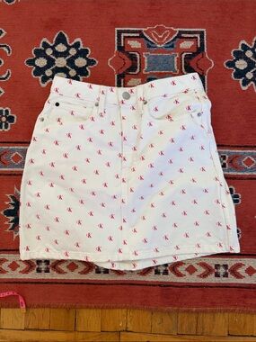 Calvin Klein White Denim Mini Skirt with Red CK Logo Pattern